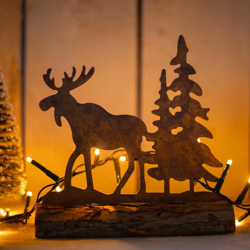 Rusty moose on wood base